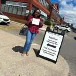 Driving instructor Oakville congratulates student with new license, Kilbride area.