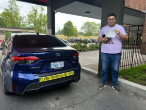 Happy Student Smiling at The Driving Tutors - Mississauga Driving School